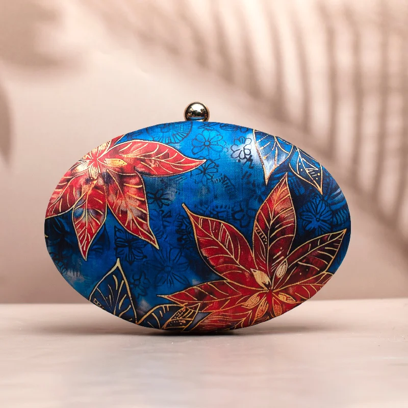 Women's Glittery Clutch in Blue for Disco - Themed EventsBlue Flower Printed Oval Clutch