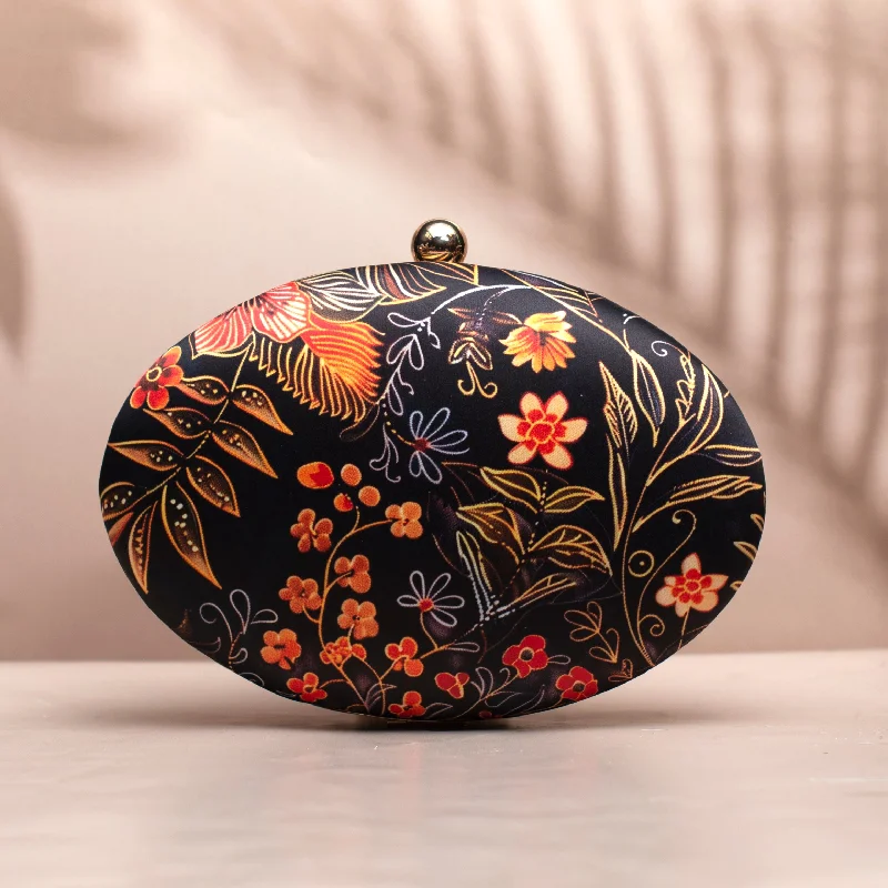 Snake - Skin Effect Clutch in Green for Exotic PartiesOrange Floral And Leaves Printed Oval Clutch